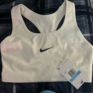 Brand new with tags Nike Womens Sports bra size medium White